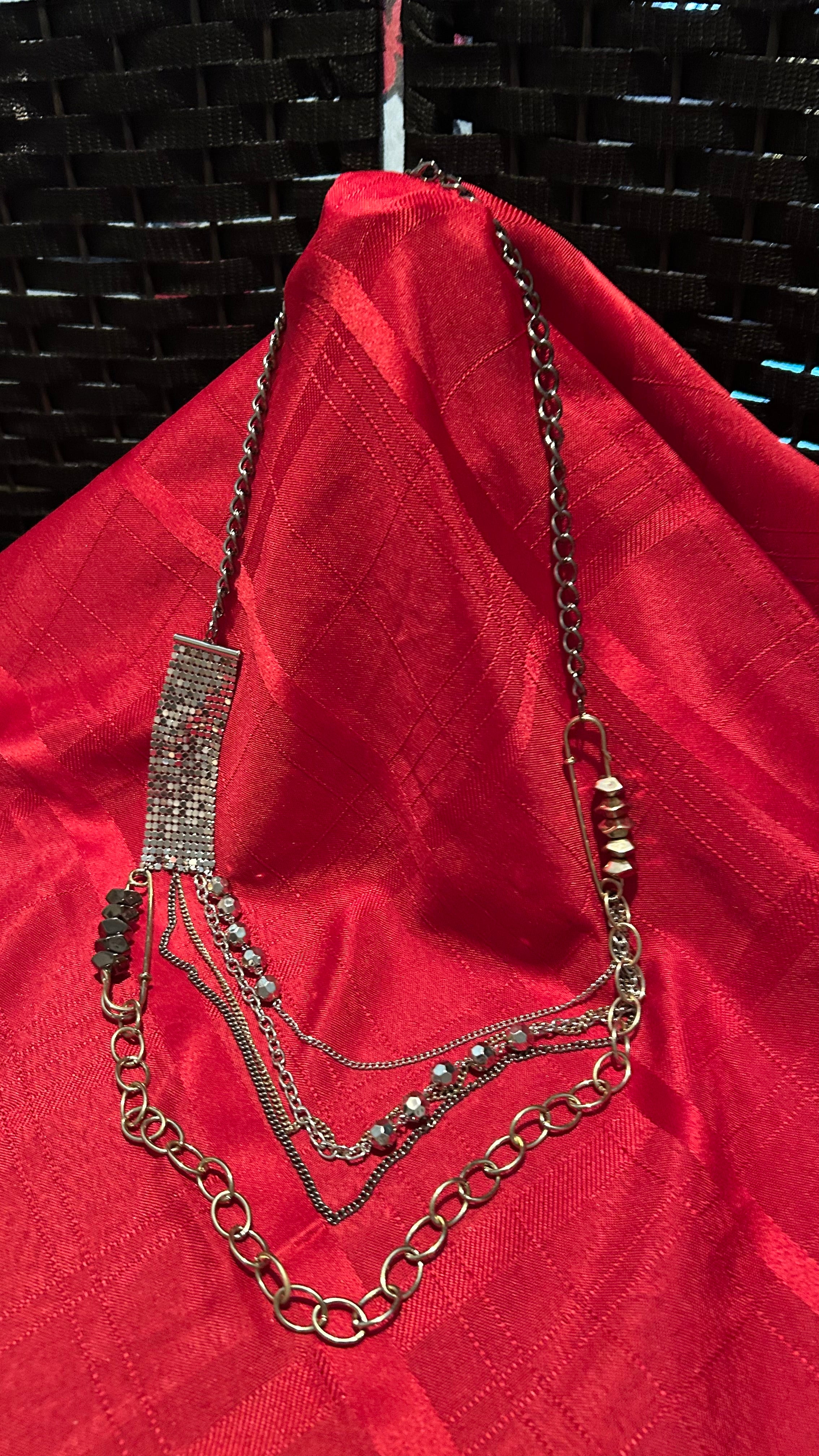 multi-strand silver-tone statement necklace,