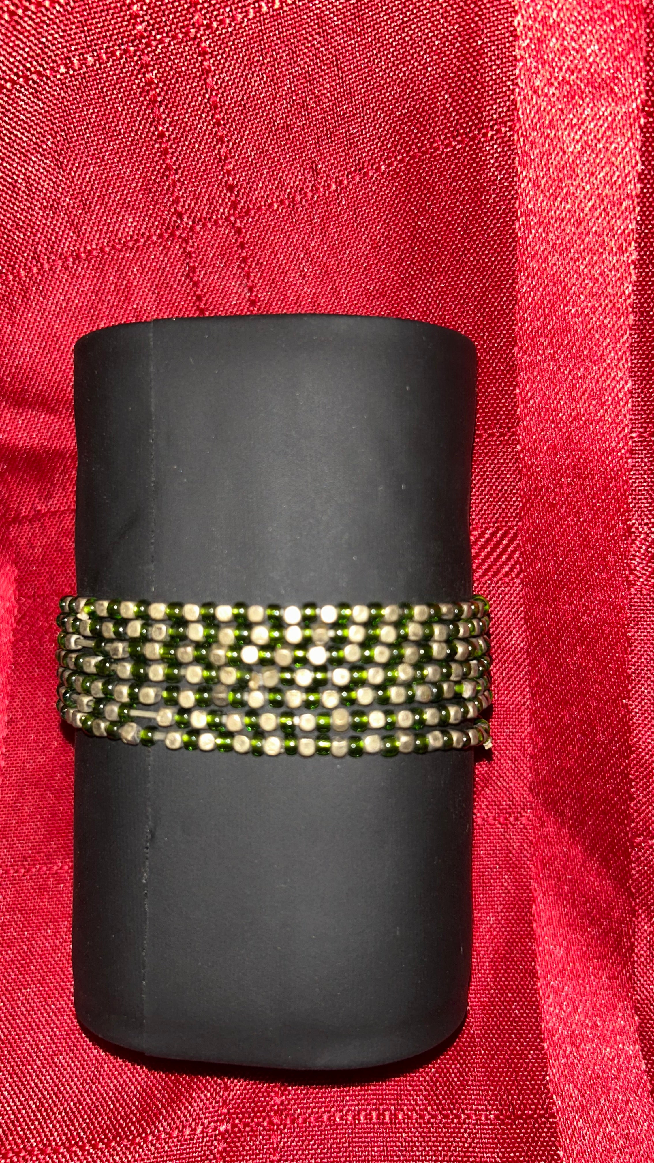 Wide multi-strand beaded stretch cuff bracelet. It