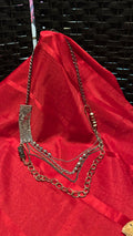 multi-strand silver-tone statement necklace,