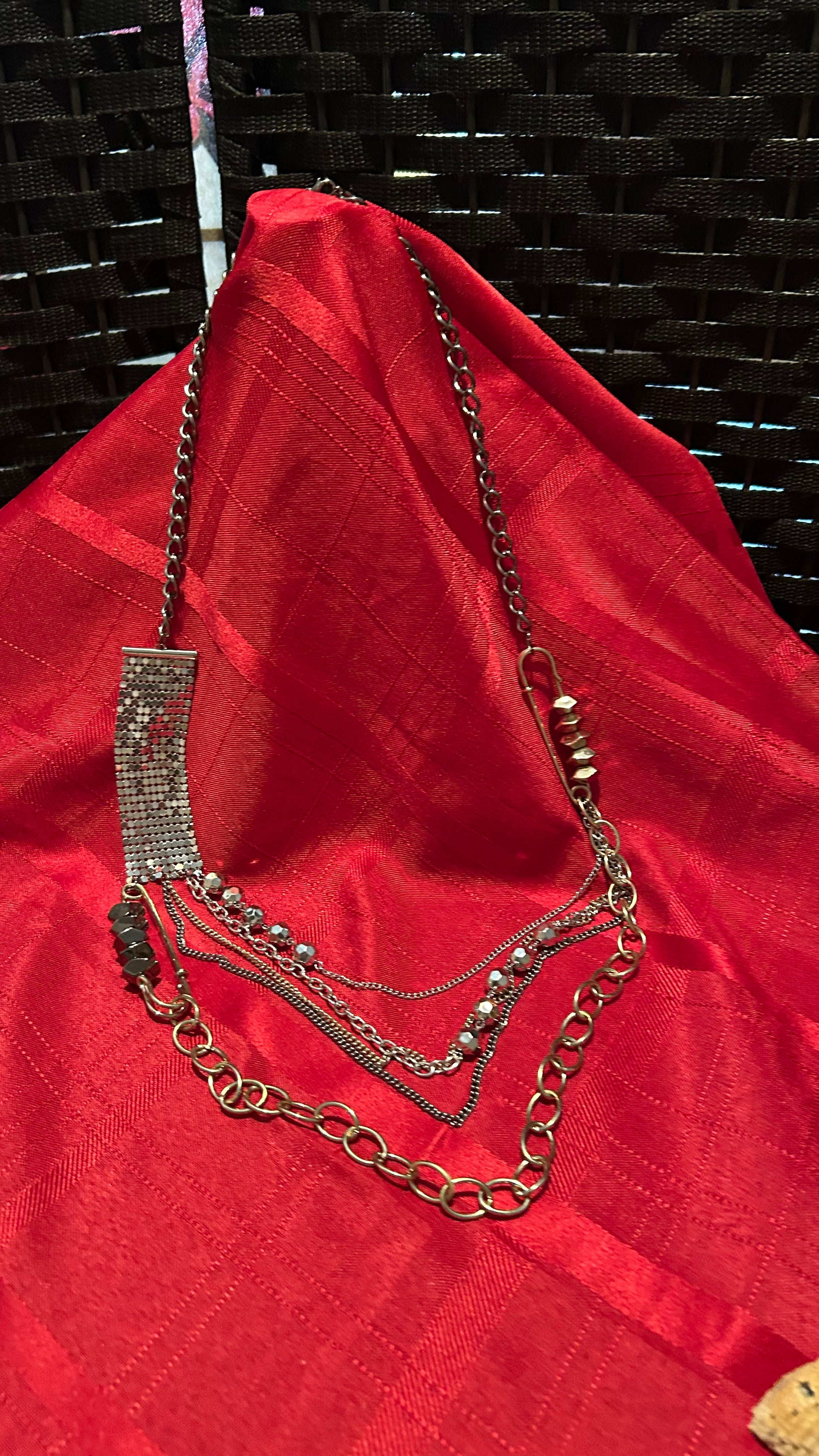 multi-strand silver-tone statement necklace,