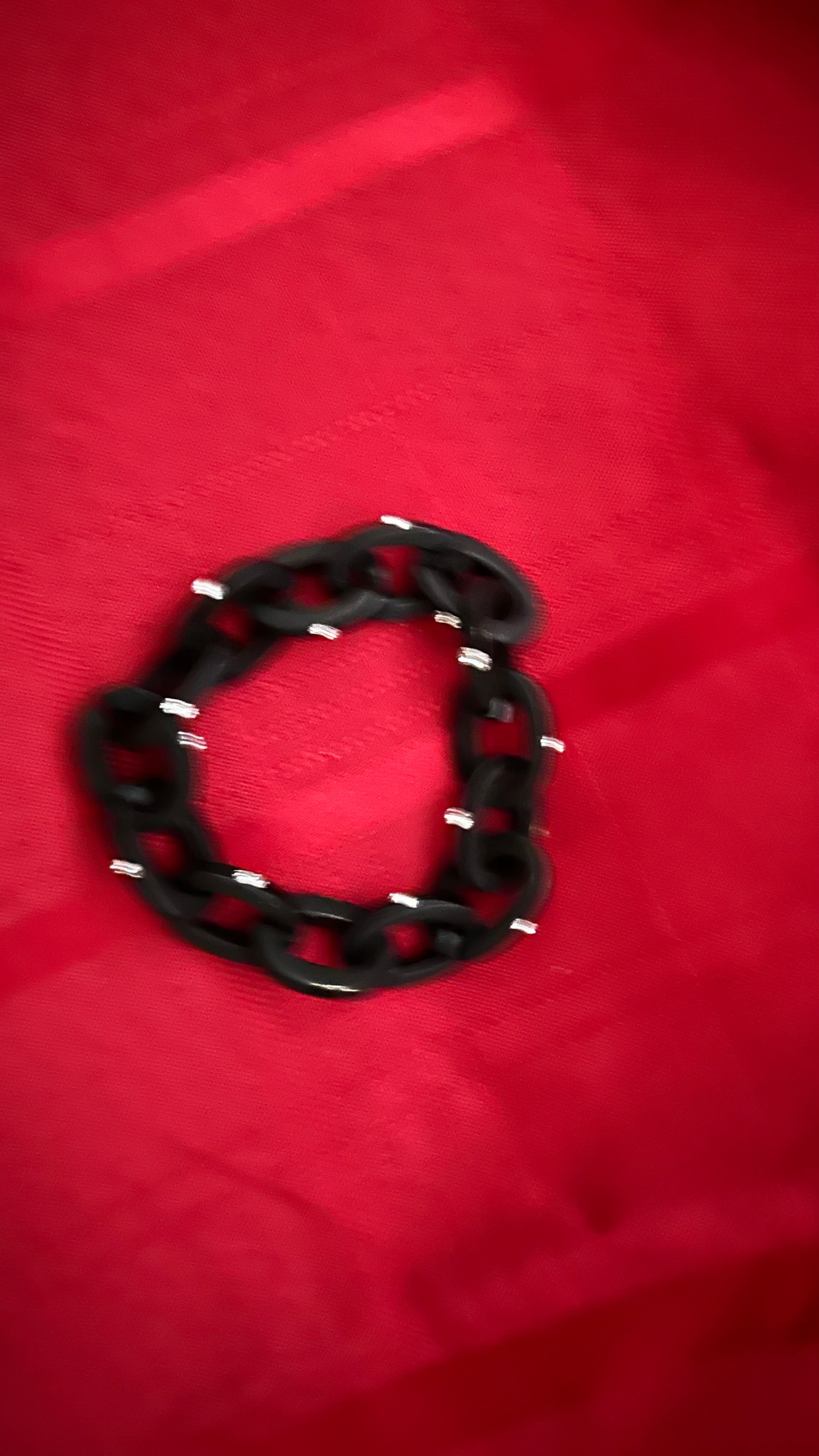 black chain-link bracelet