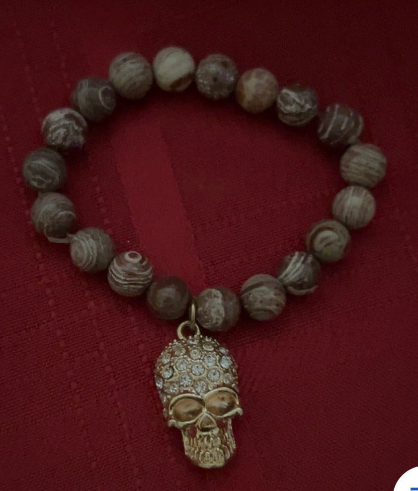 Picture Jasper beads and a central skull charm.