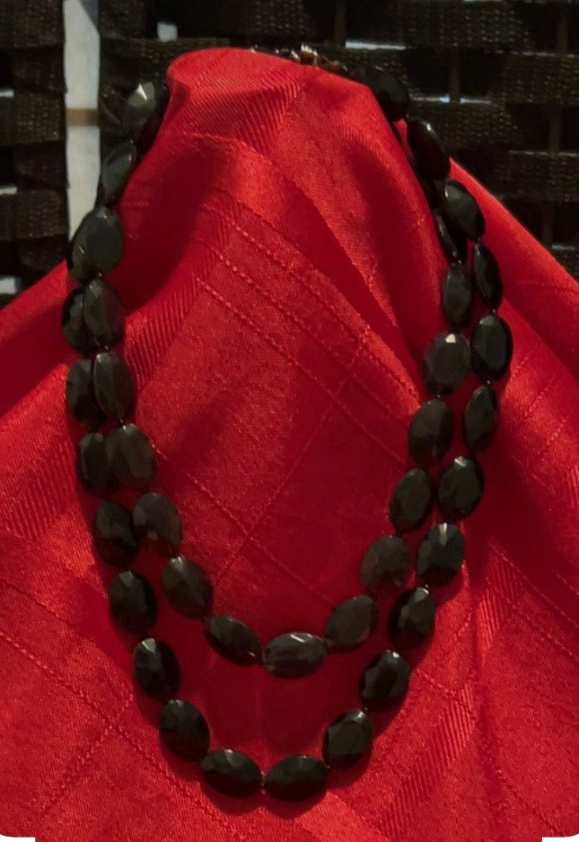 Vintage -style double-strand black beaded necklace.