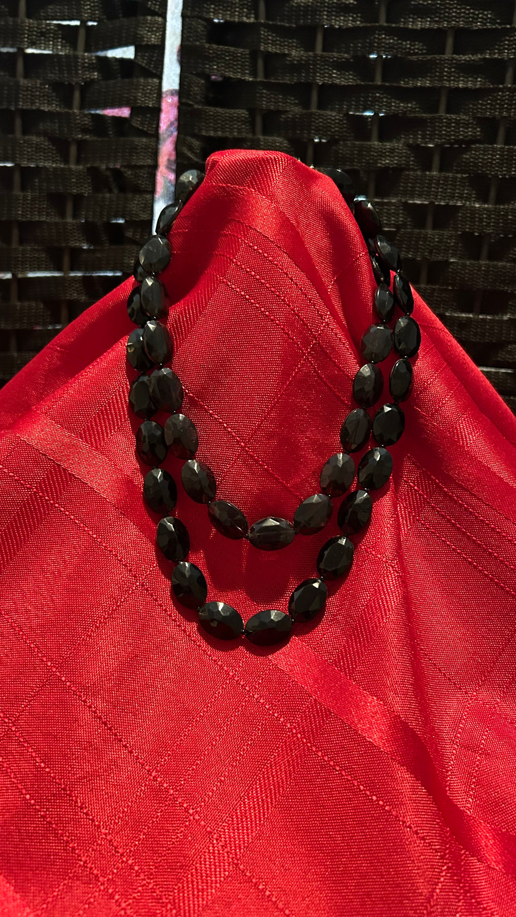 Vintage -style double-strand black beaded necklace.