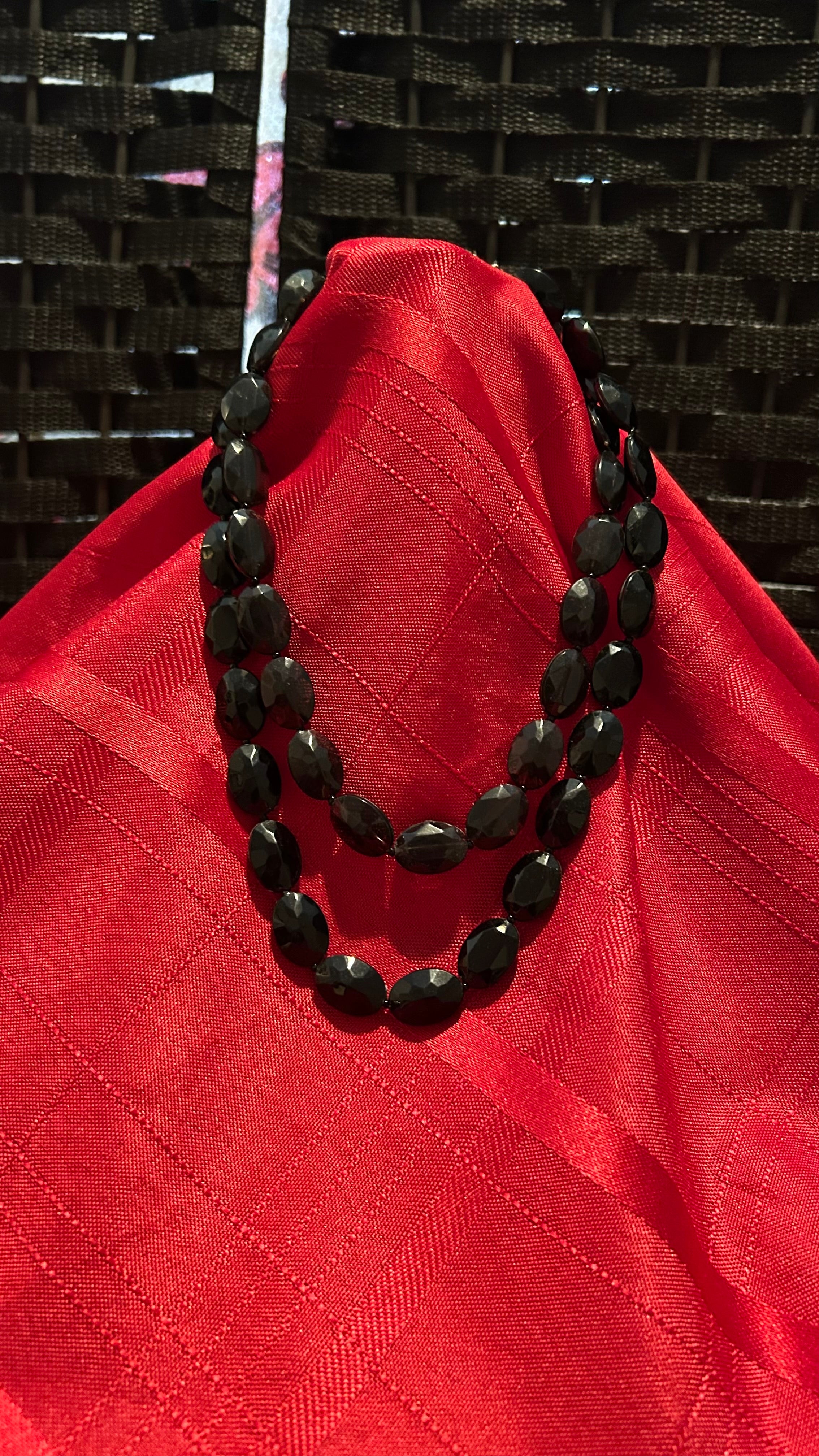 Vintage -style double-strand black beaded necklace.