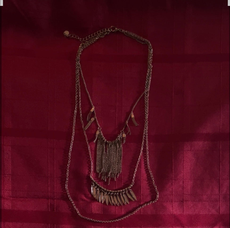 multi-layered fringe statement piece
