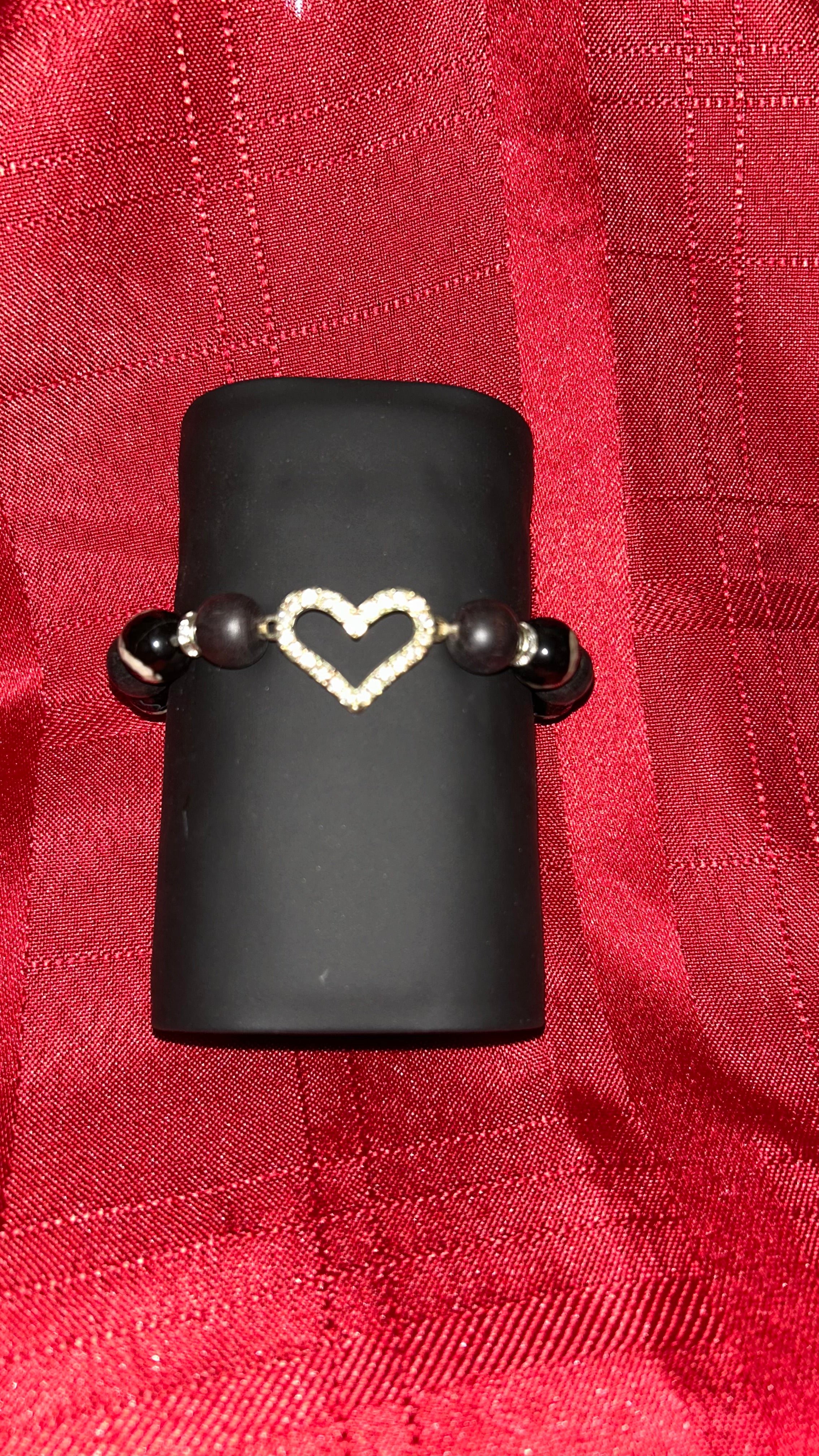 prominent heart-shaped centerpiece