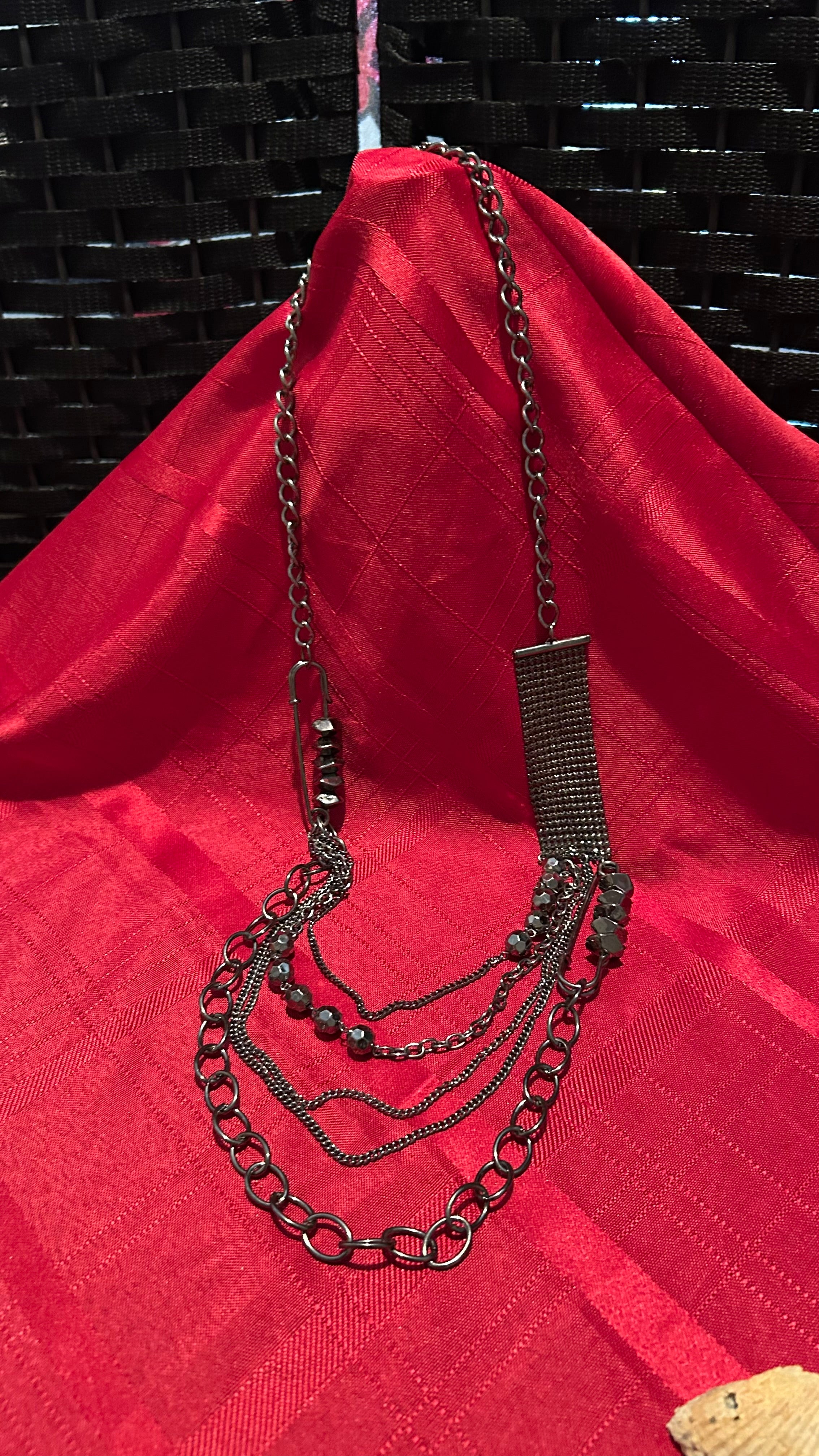 multi-strand silver-tone statement necklace,