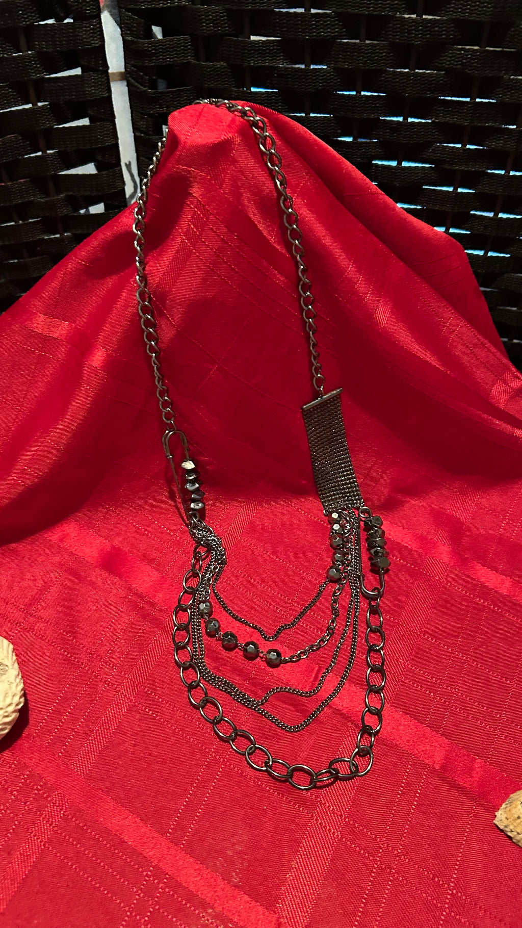 multi-strand silver-tone statement necklace,