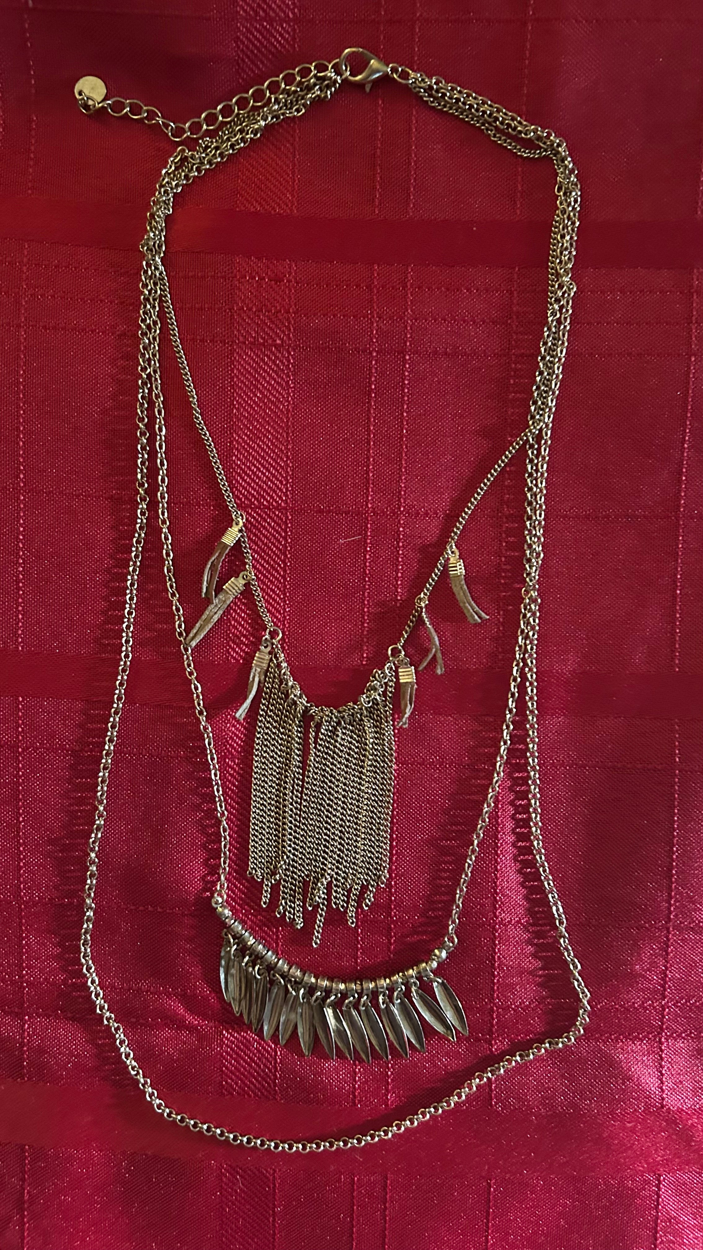 multi-layered fringe statement piece
