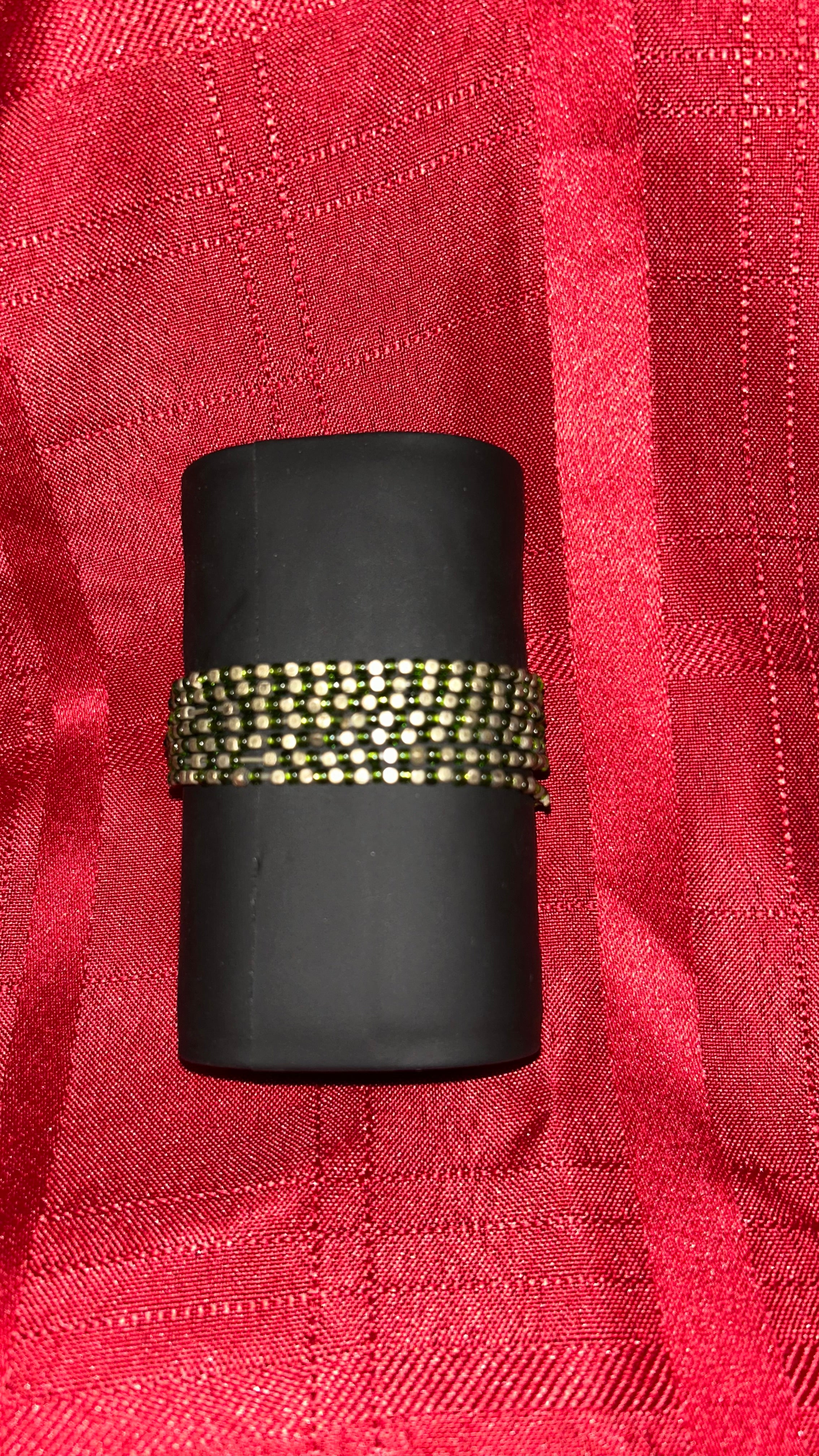 Wide multi-strand beaded stretch cuff bracelet. It