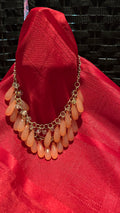 Peach briolette bib necklace