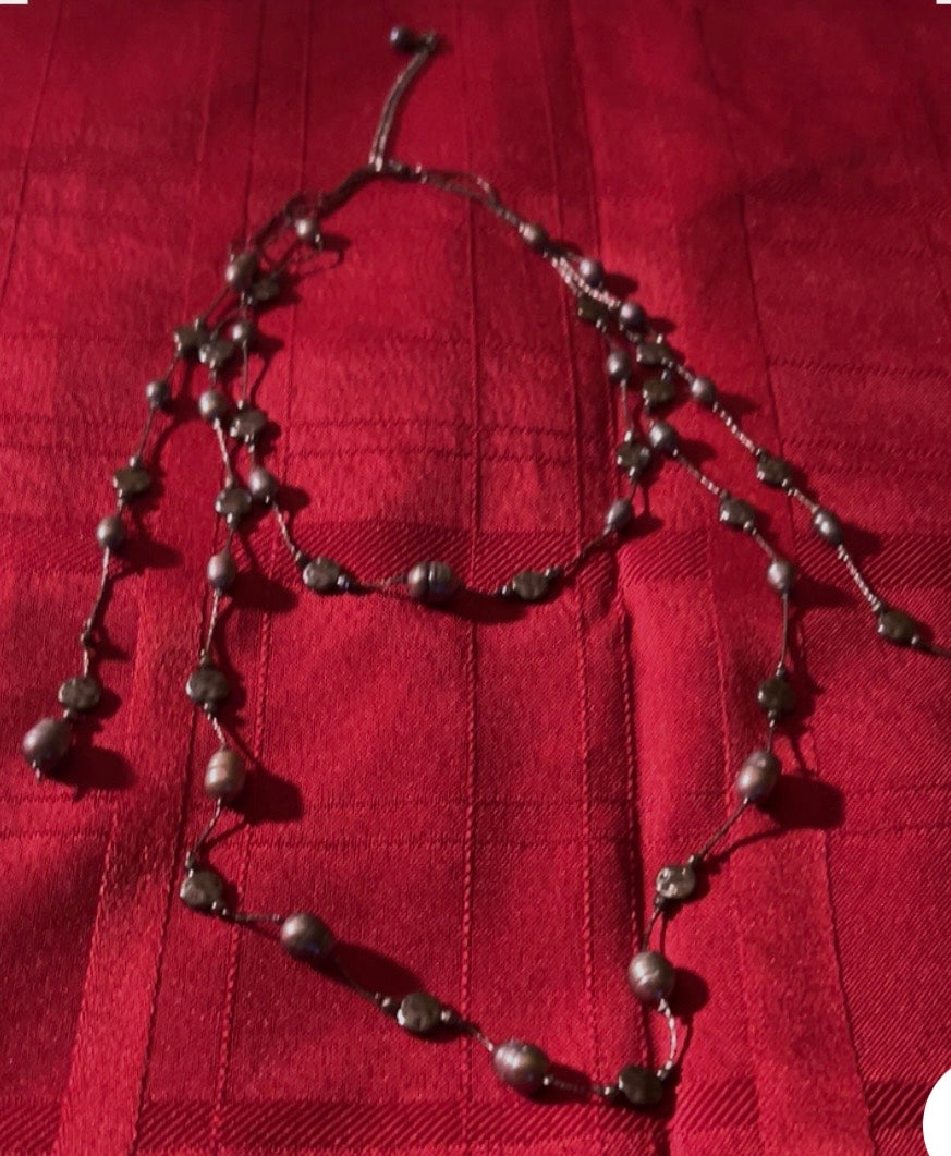 Long double-strand beaded necklace