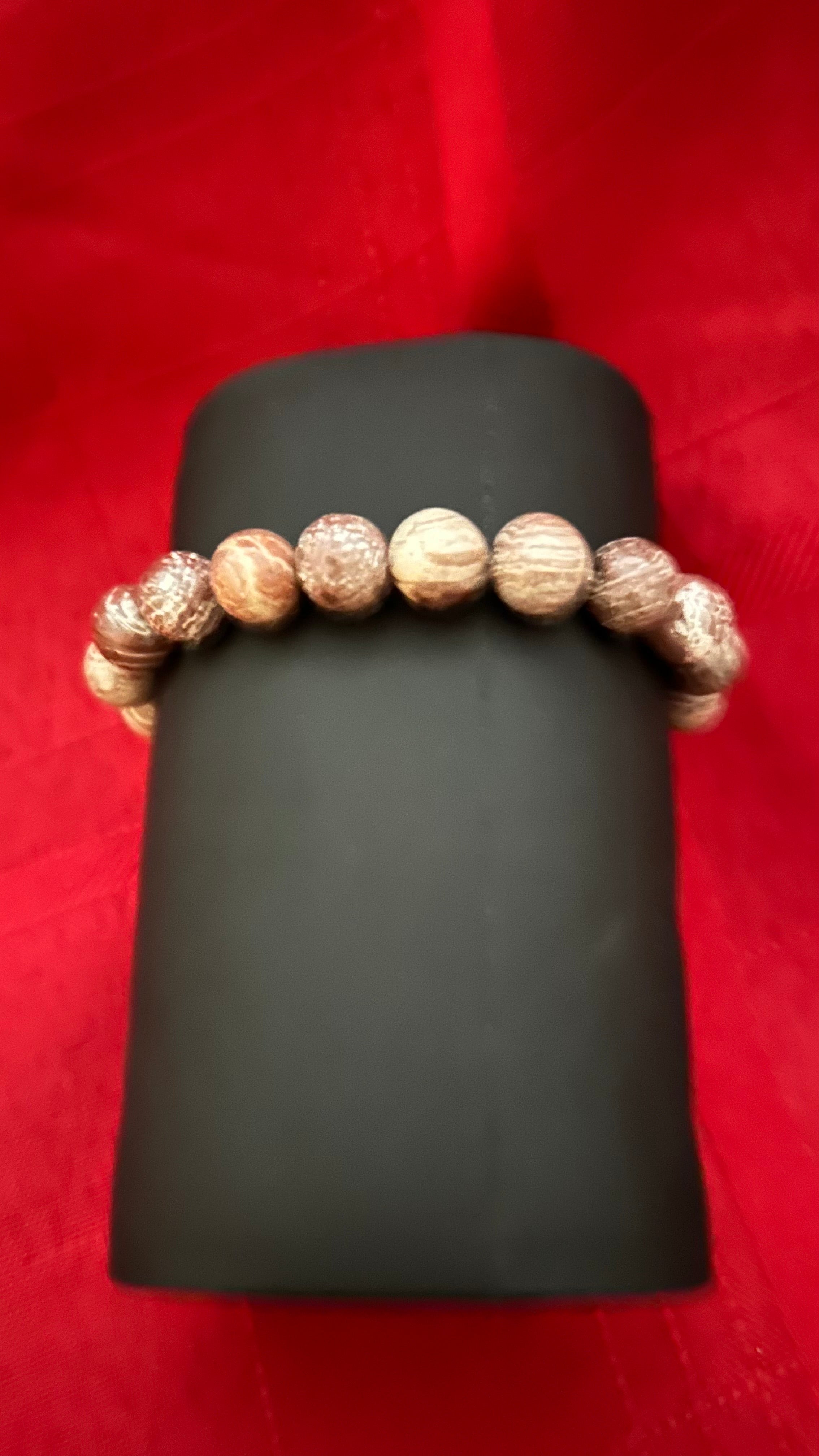 Picture Jasper beads and a central skull charm.