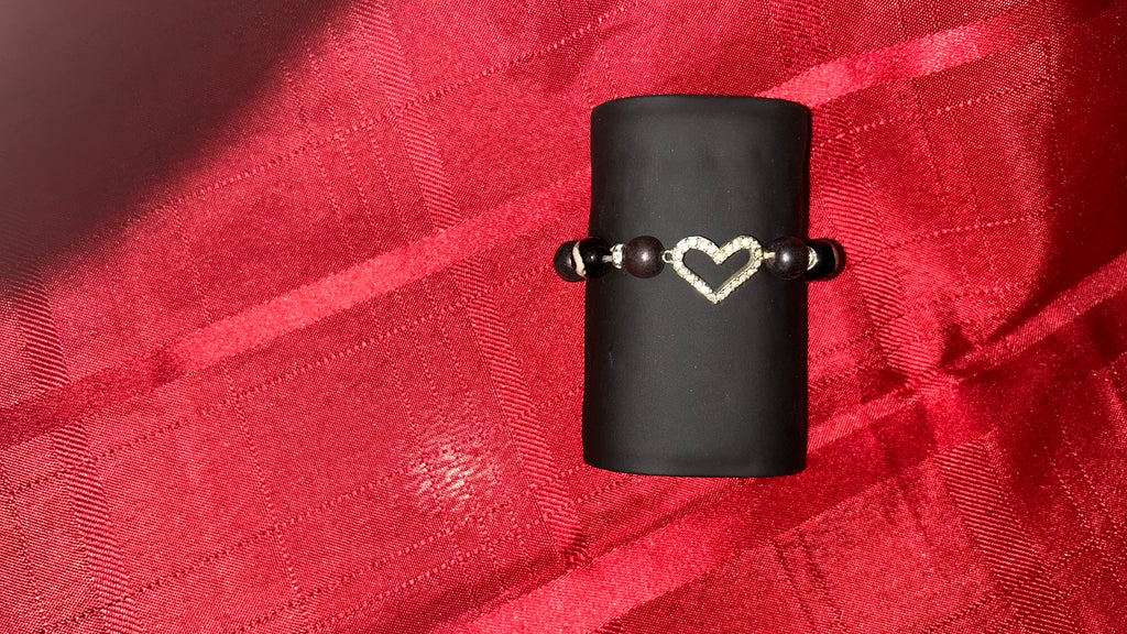 prominent heart-shaped centerpiece