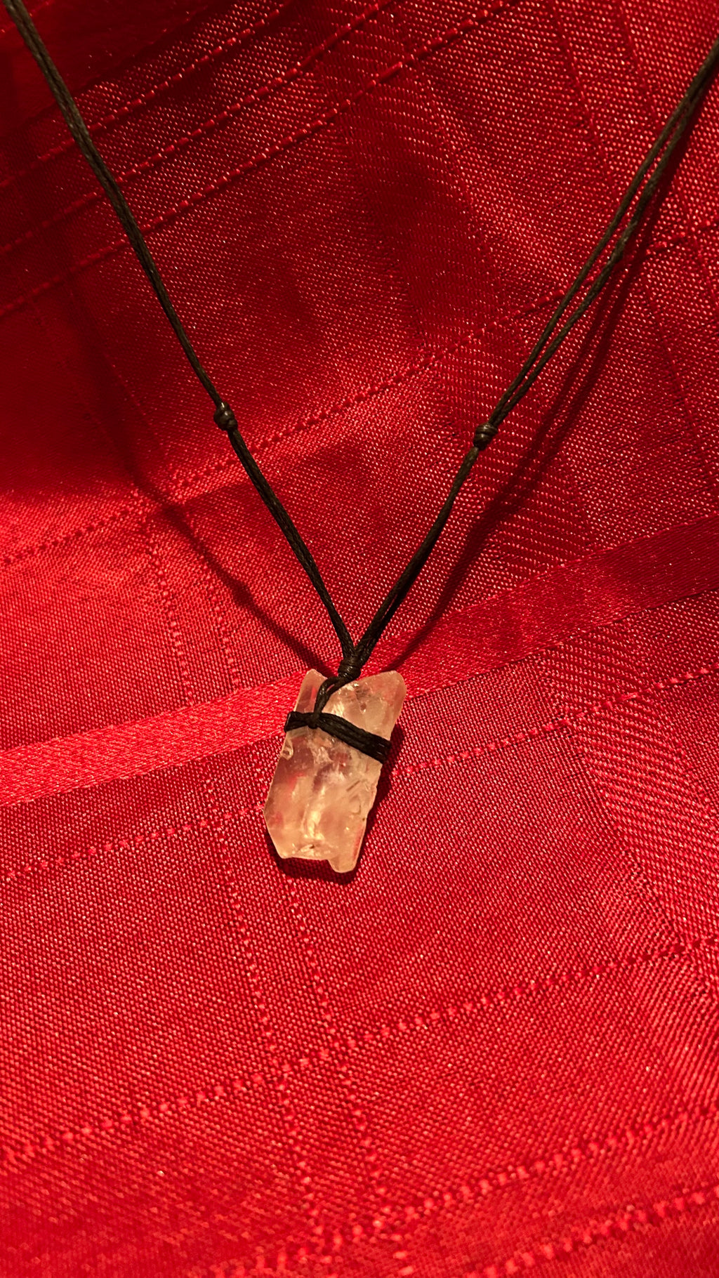 Raw clear quartz pendant
